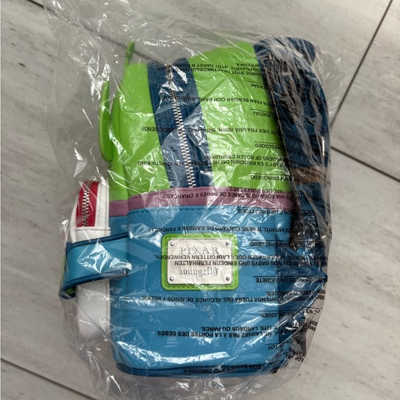 Loungefly Blue and Green Alien Backpack - Picture 6 of 13